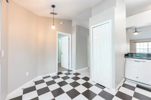 a view of a refrigerator and window