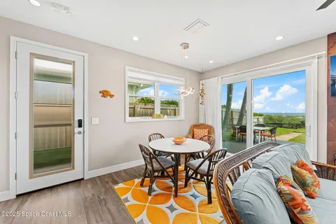 a view of a house with a yard and plant