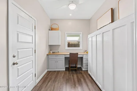 a view of a kitchen from the hallway