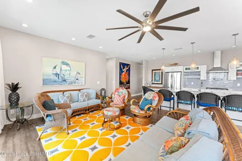 a kitchen with stainless steel appliances a refrigerator sink and cabinets
