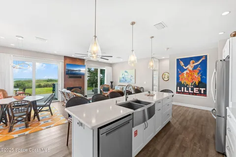 a view of a living room and dining room