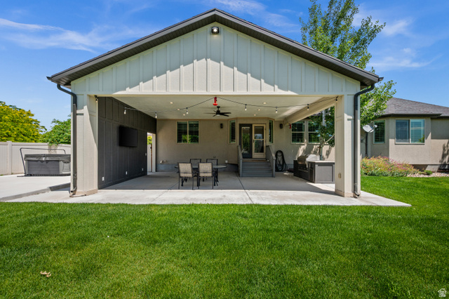4077 Rons Court Riverton, UT 84096 - Photo 39 of 48 The ultimate outdoor gathering space, this covered patio offers comfort, shade, and plenty of room to enjoy time with the people who matter most.