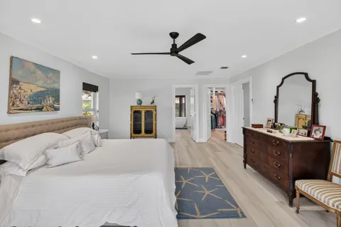 a view of a dining room with furniture water view and mountain view