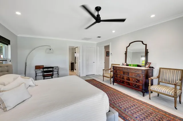 a view of a house with swimming pool and a yard