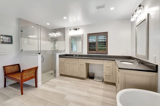 an aerial view of a houses and an outdoor space