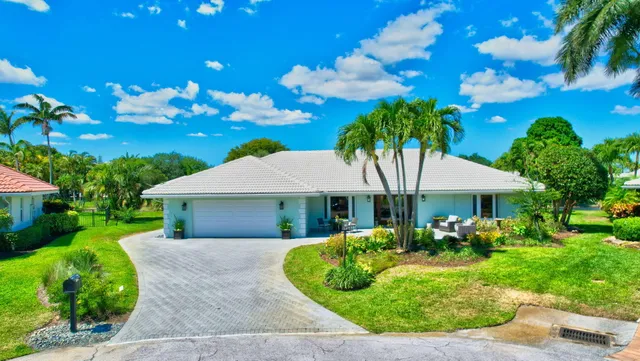 a view of a house with swimming pool