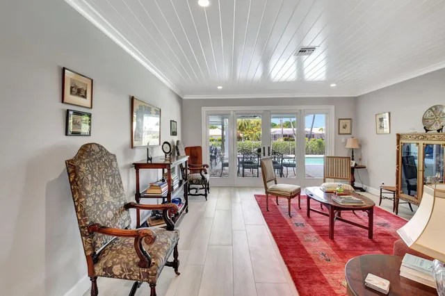 a living room with furniture and a table
