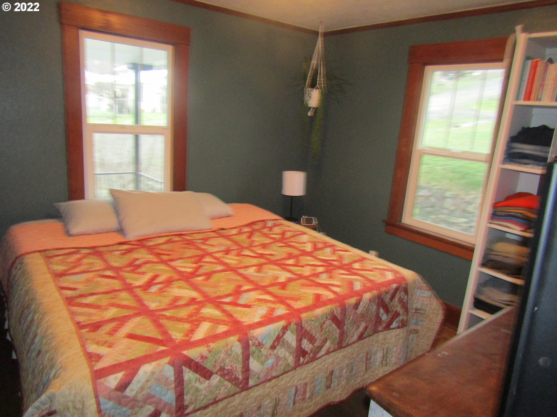 807 Southwest 2nd Street Pendleton, OR 97801 - Photo 11 of 21 a bedroom with a bed and a large window