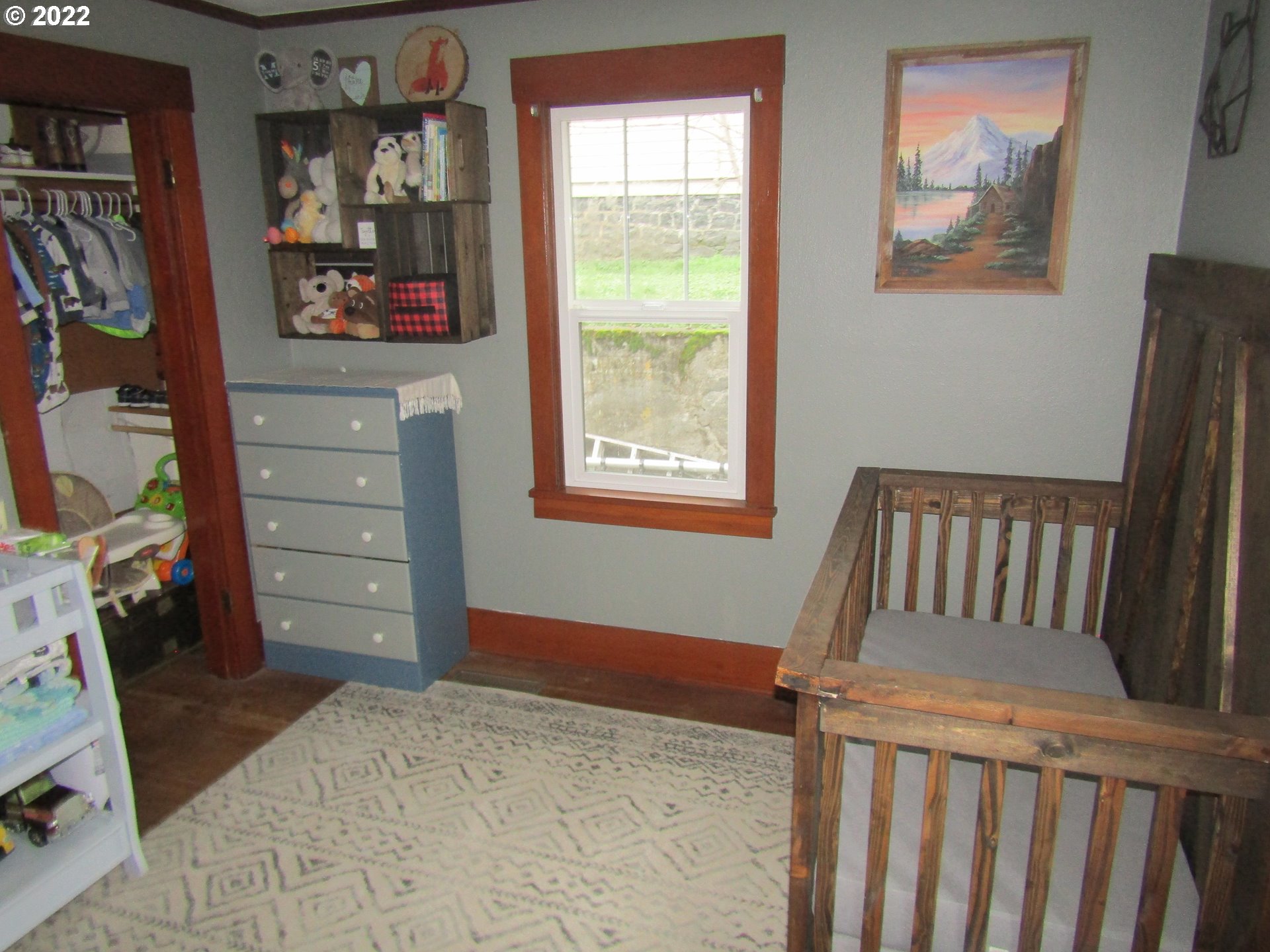 807 Southwest 2nd Street Pendleton, OR 97801 - Photo 15 of 21 a bedroom with a bed and a window