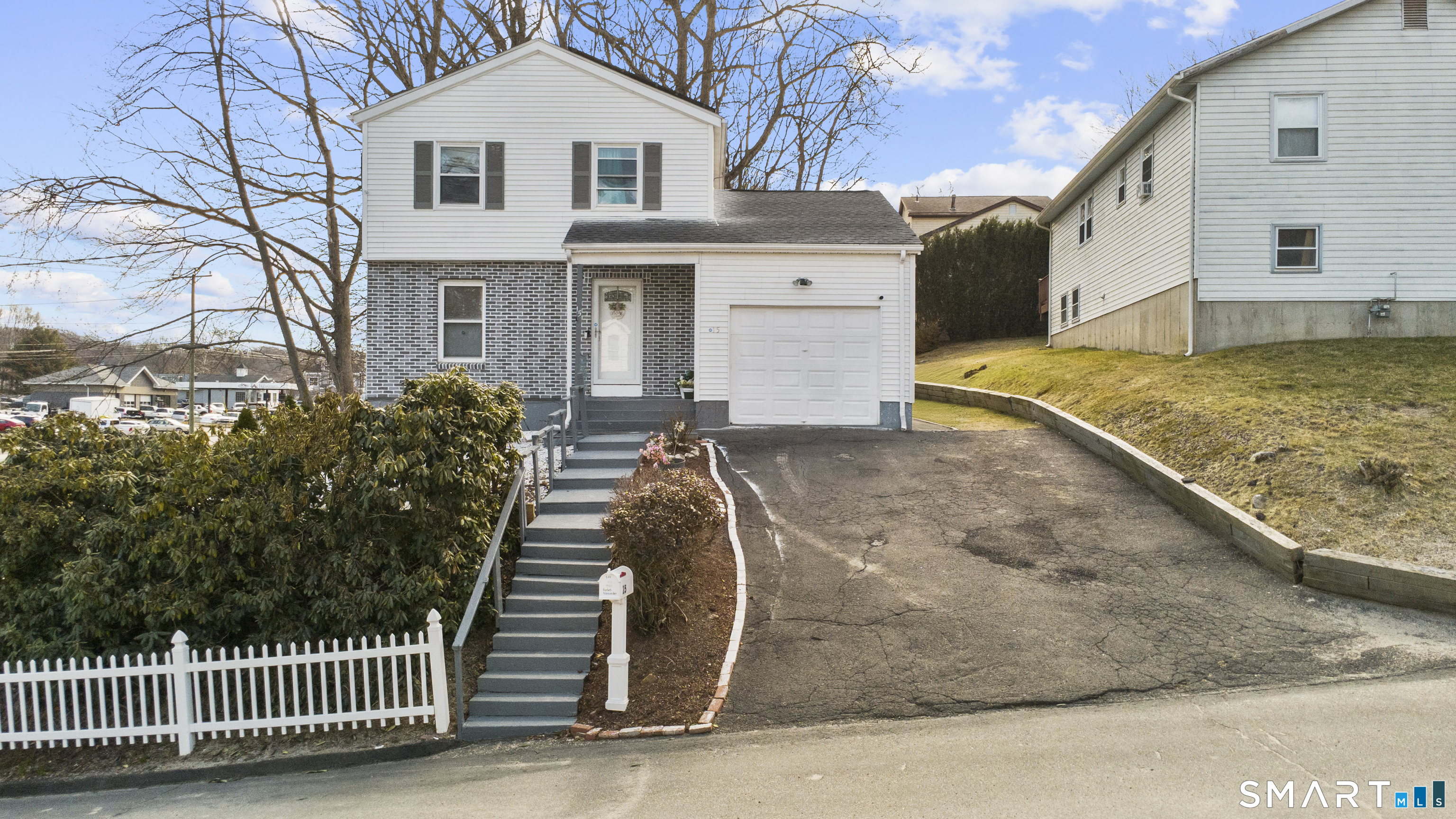 15 Kenneth Circle Waterbury, CT 06710 - Photo 1 of 31 a front view of a house with a yard