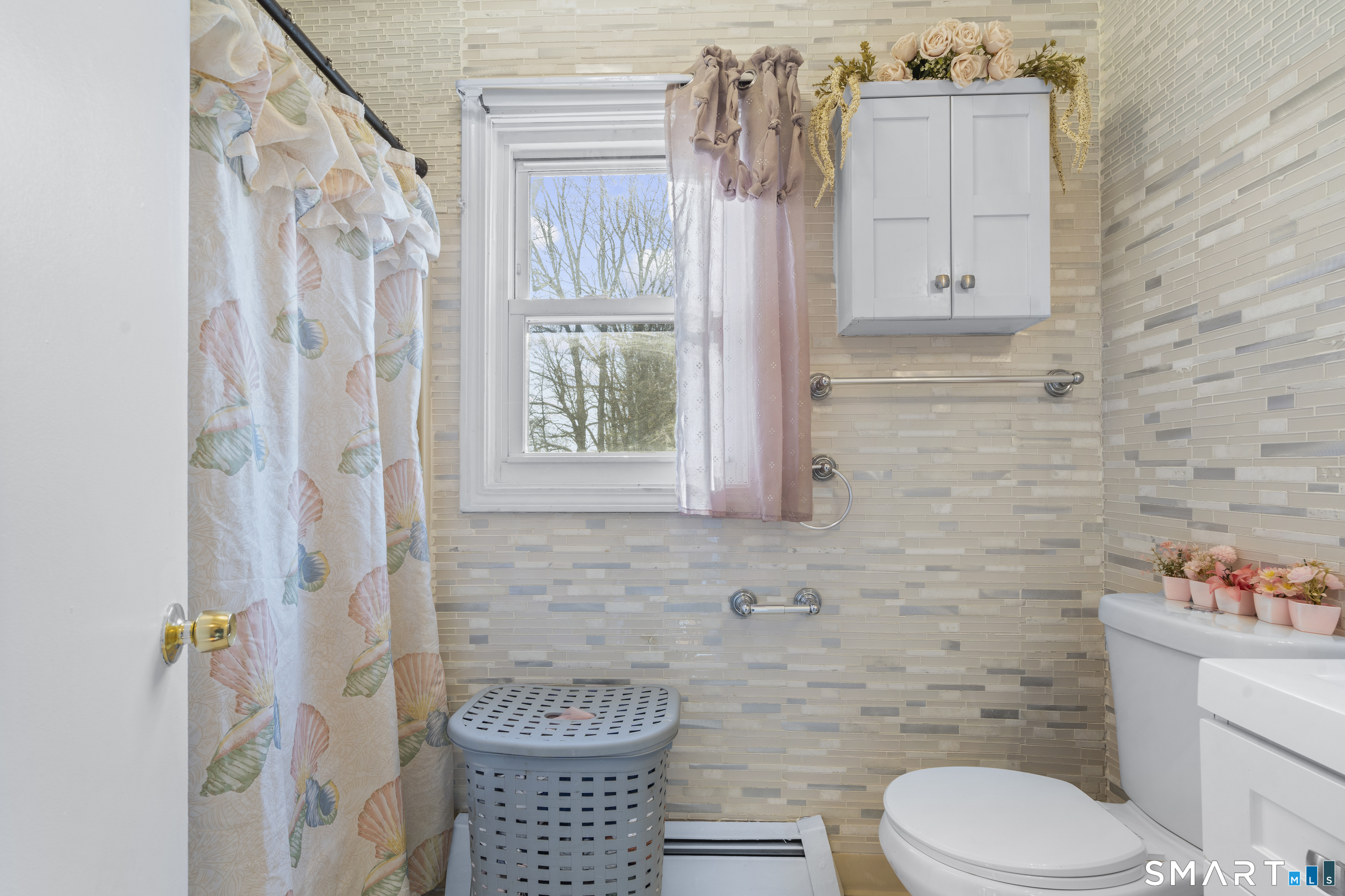 15 Kenneth Circle Waterbury, CT 06710 - Photo 20 of 31 a bathroom with a toilet and a shower