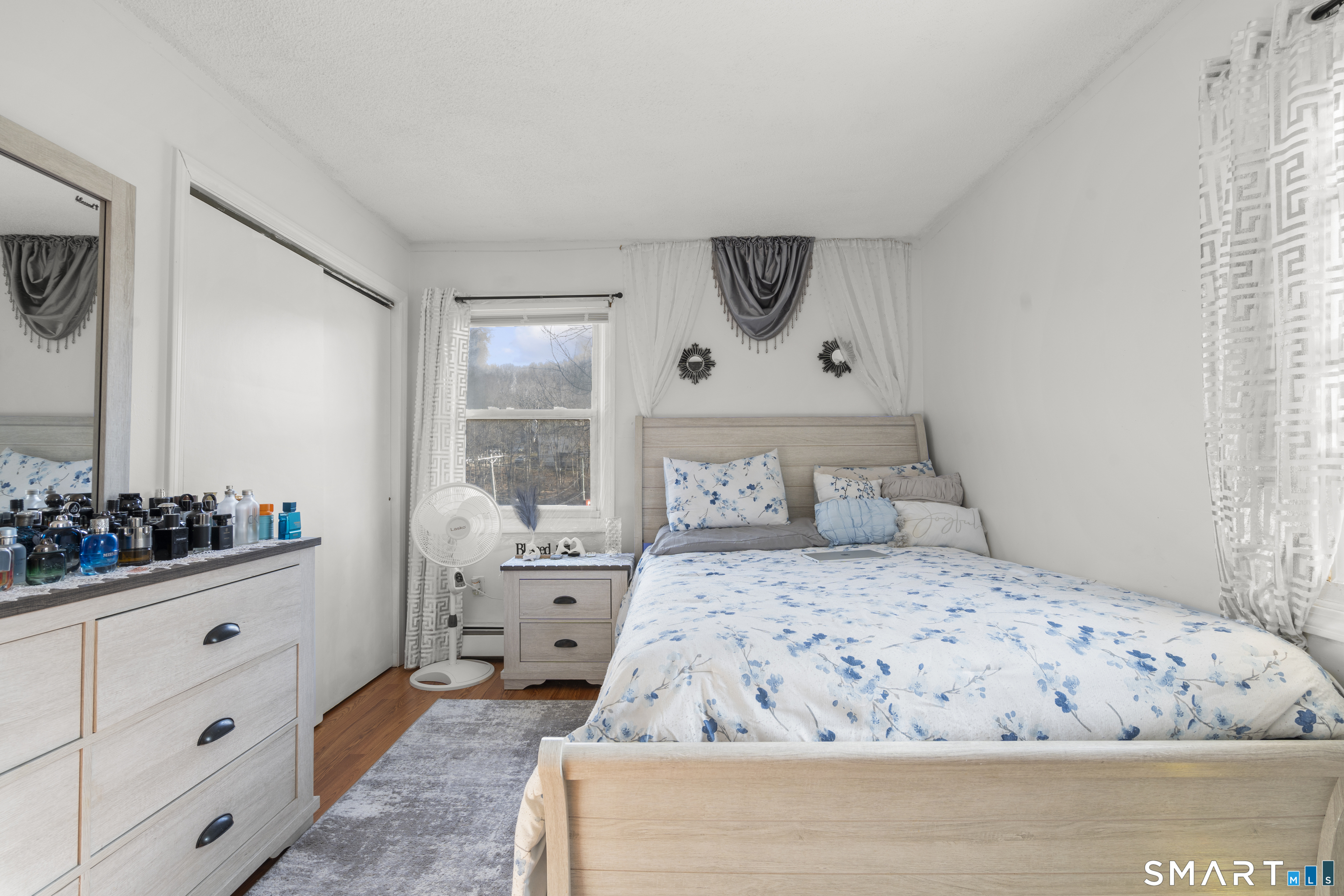 15 Kenneth Circle Waterbury, CT 06710 - Photo 22 of 31 a bedroom with a large bed and a window
