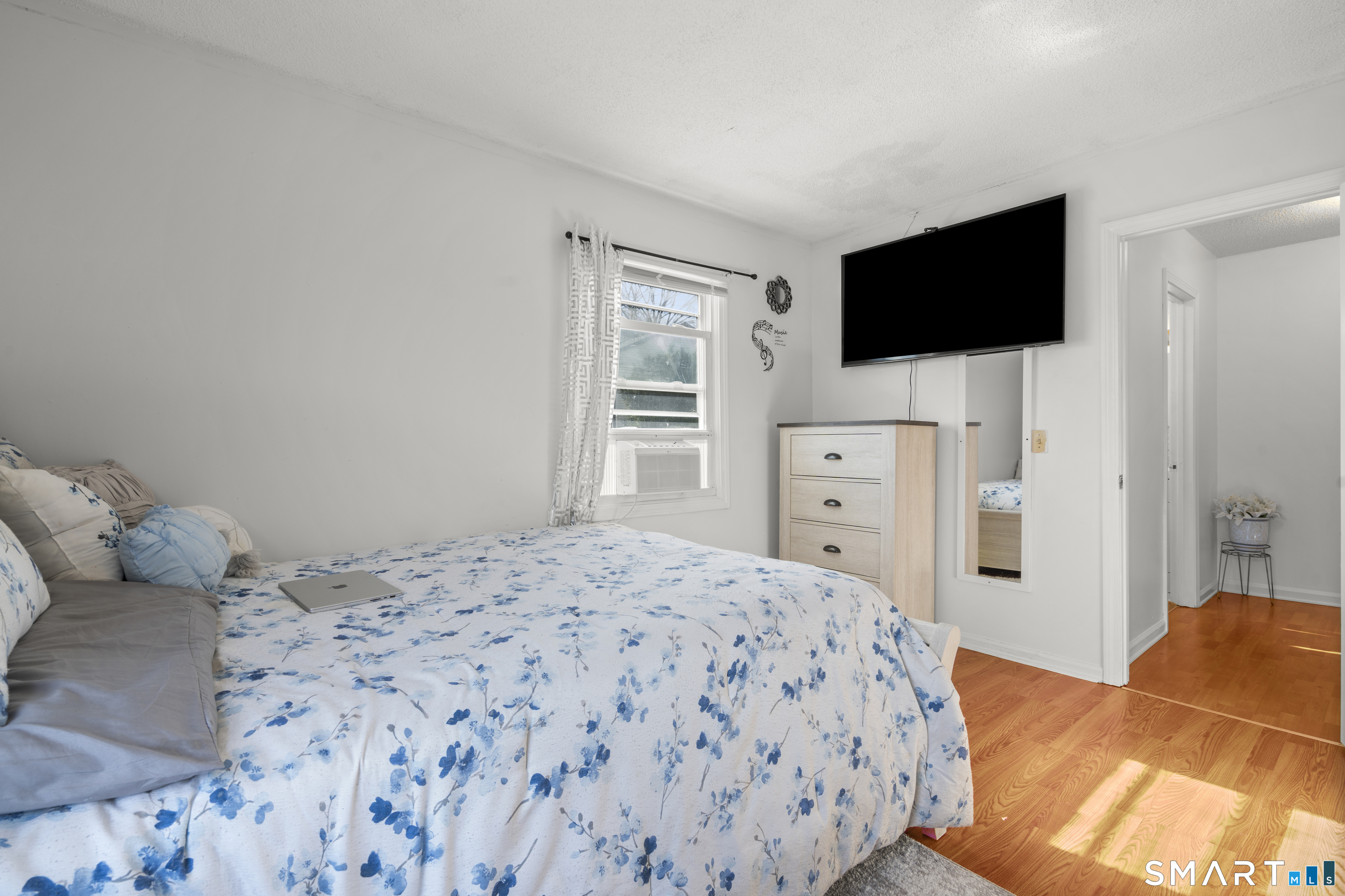 15 Kenneth Circle Waterbury, CT 06710 - Photo 23 of 31 a bedroom with a bed and flat screen tv