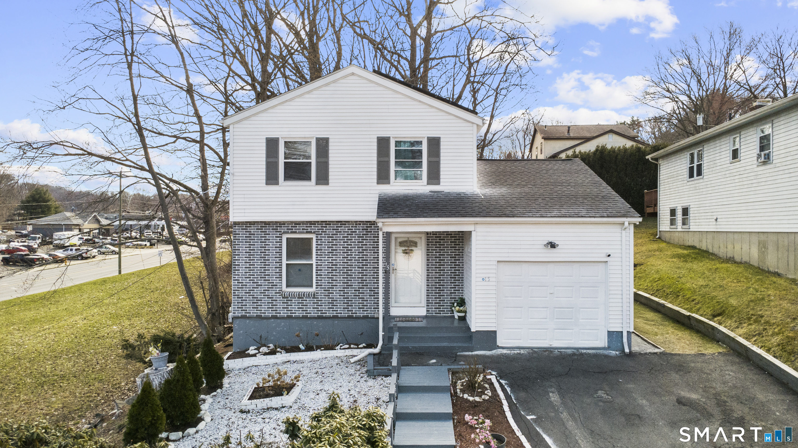 15 Kenneth Circle Waterbury, CT 06710 - Photo 3 of 31 a front view of a house with a yard