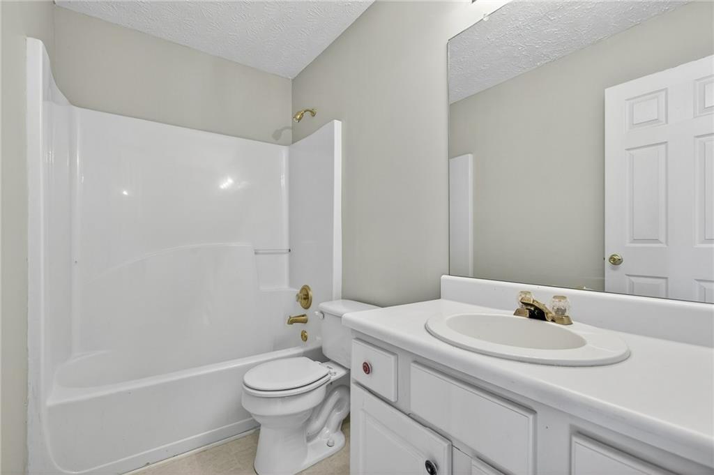 45 Polo Fields Northeast Cartersville, GA 30121 - Photo 40 of 49 a bathroom with a sink toilet and shower