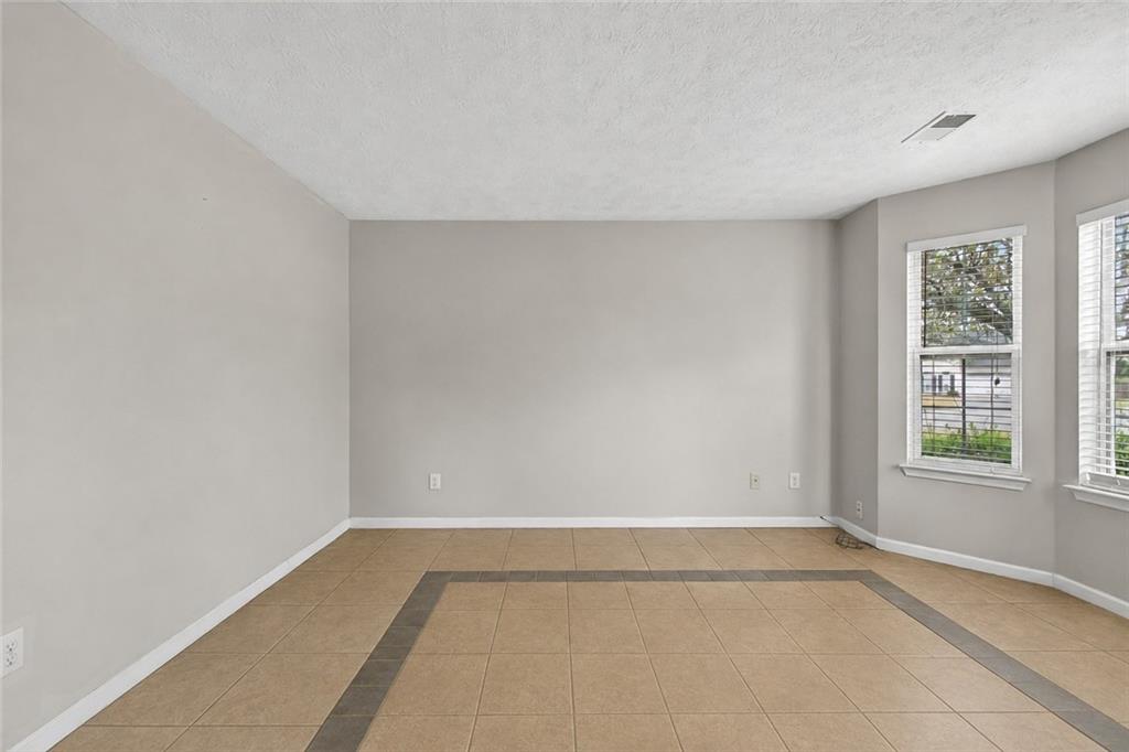 45 Polo Fields Northeast Cartersville, GA 30121 - Photo 7 of 49 a view of an empty room with a window