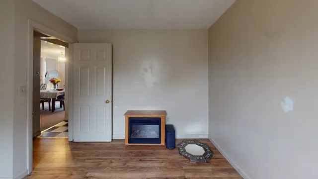 a view of livingroom with furniture and wooden floor