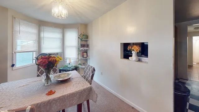 a view of a workspace with furniture