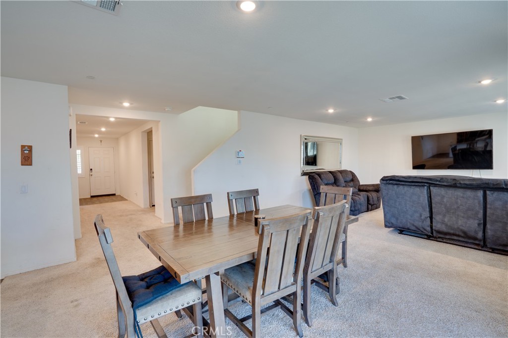 1328 Prosperity Place Hemet, CA 92543 - Photo 14 of 40 a view of a dining room with furniture