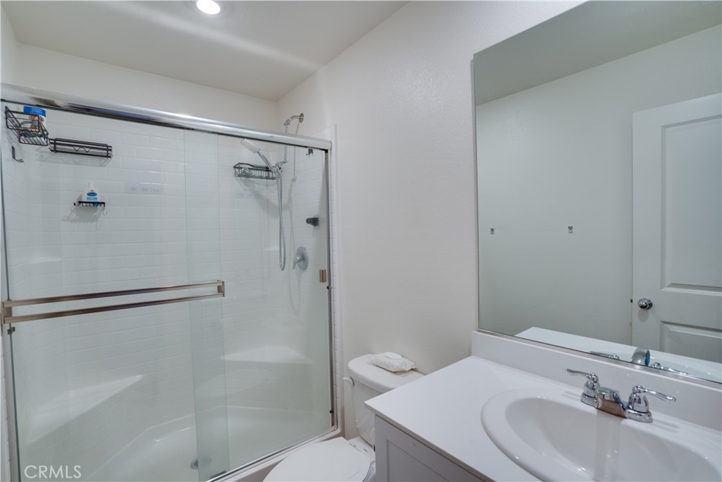 1328 Prosperity Place Hemet, CA 92543 - Photo 29 of 40 a bathroom with a sink toilet and shower