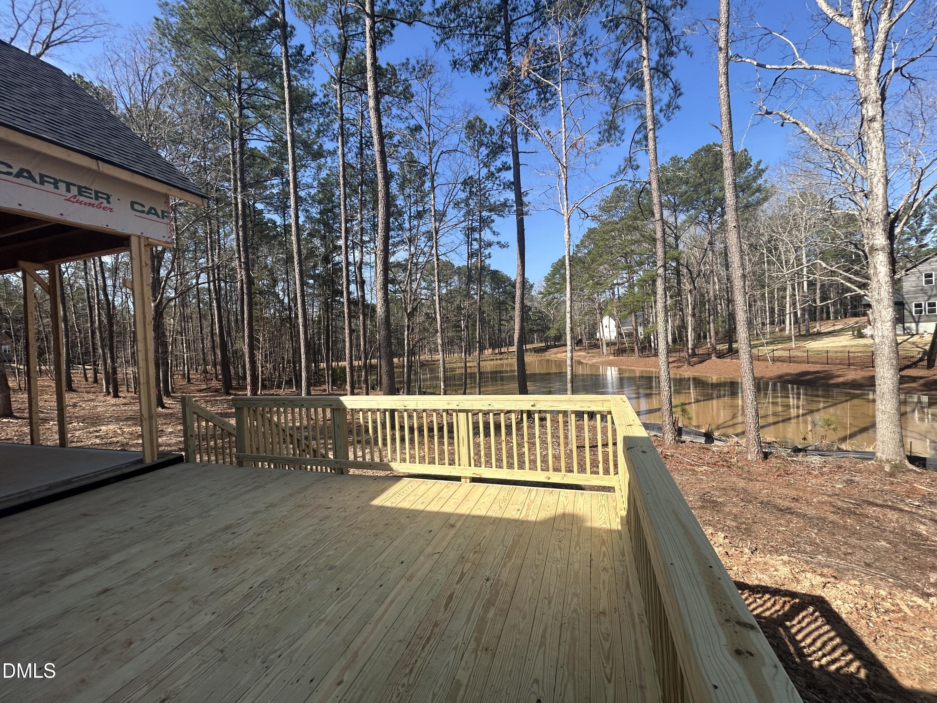 175 Landon Ridge Sanford, NC 27330 - Photo 12 of 20 a view of a chair and tables in the balcony