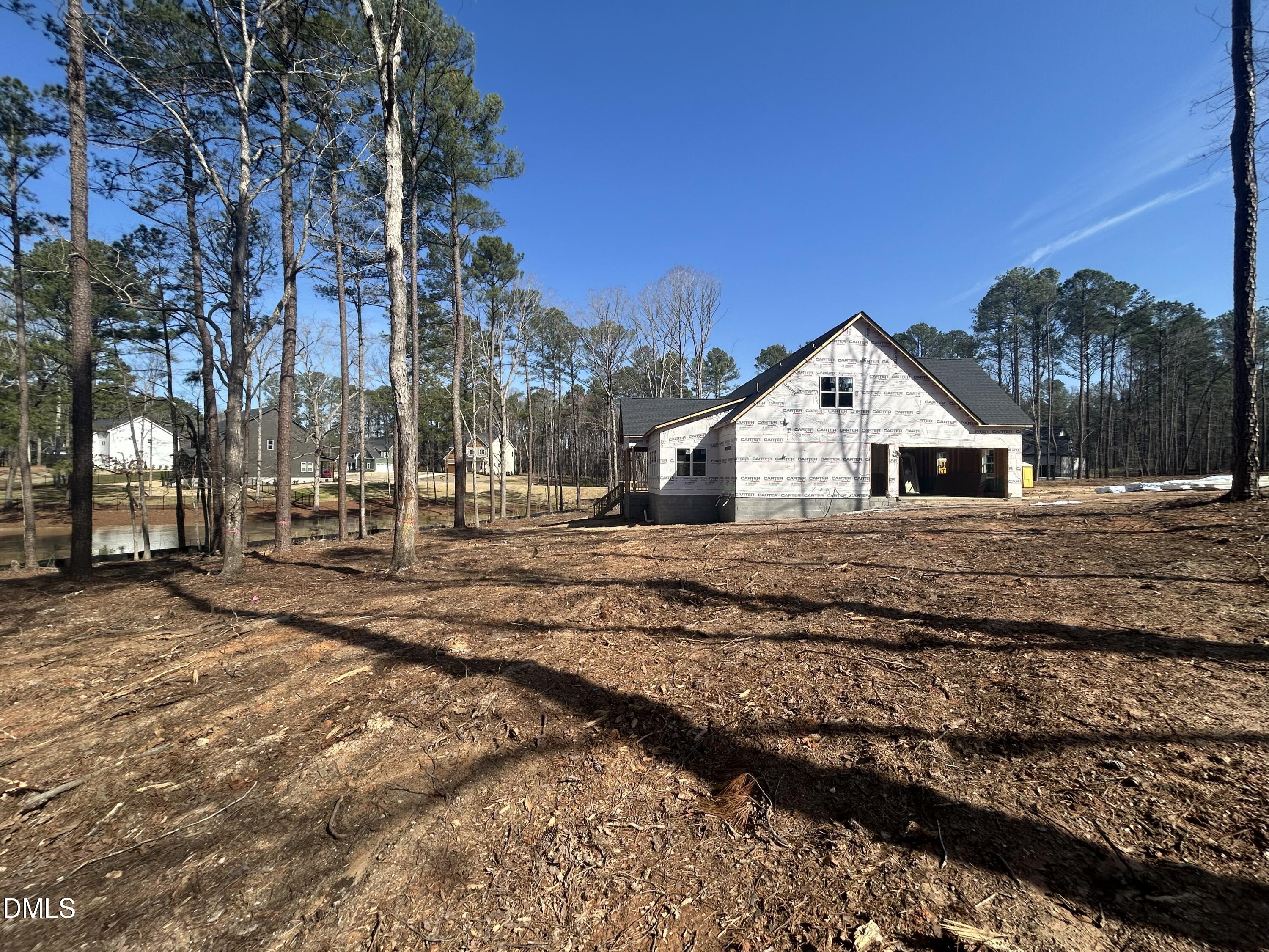 175 Landon Ridge Sanford, NC 27330 - Photo 14 of 20 a view of white house with a yard