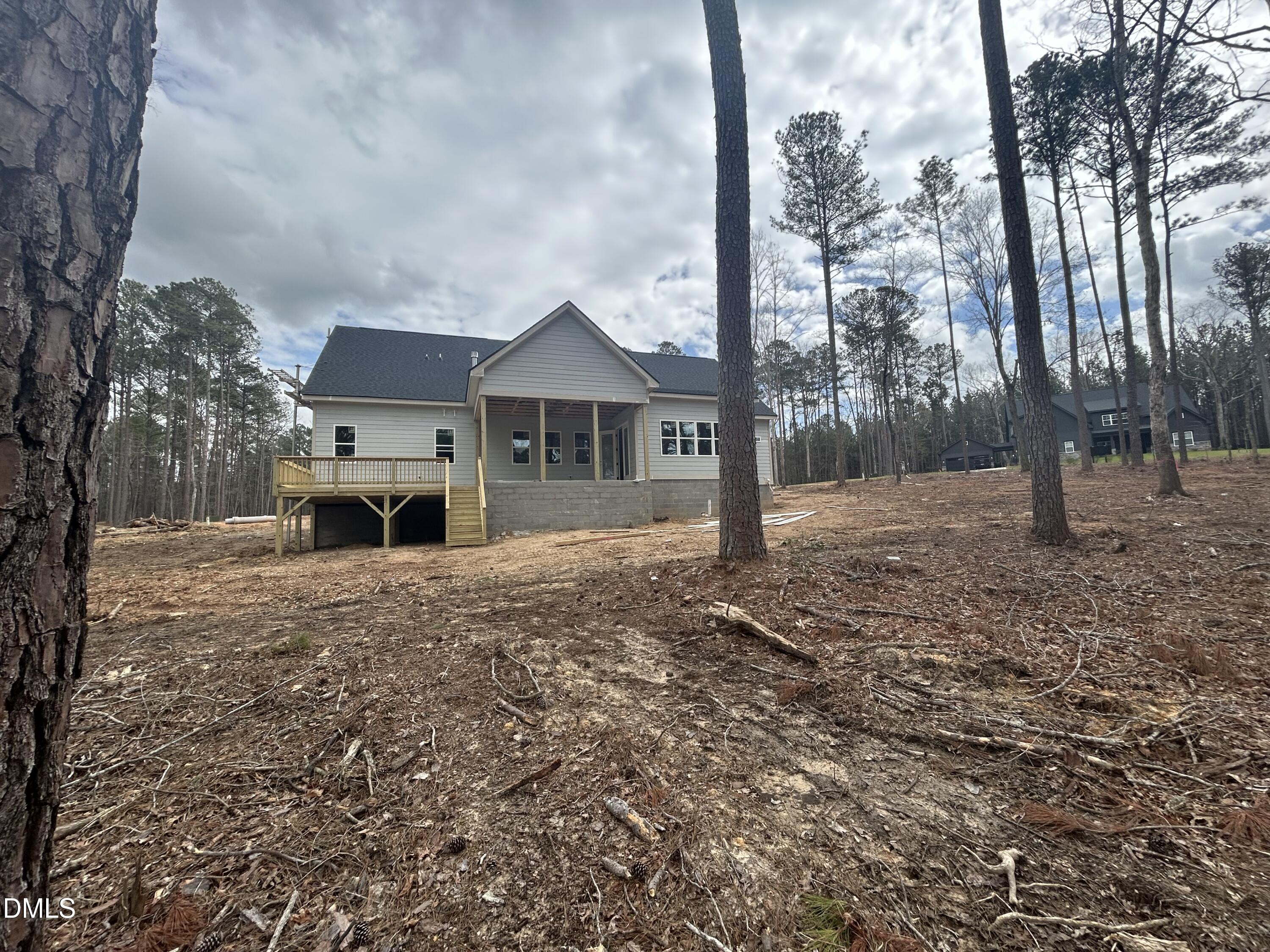 175 Landon Ridge Sanford, NC 27330 - Photo 16 of 20 a house with trees in the background