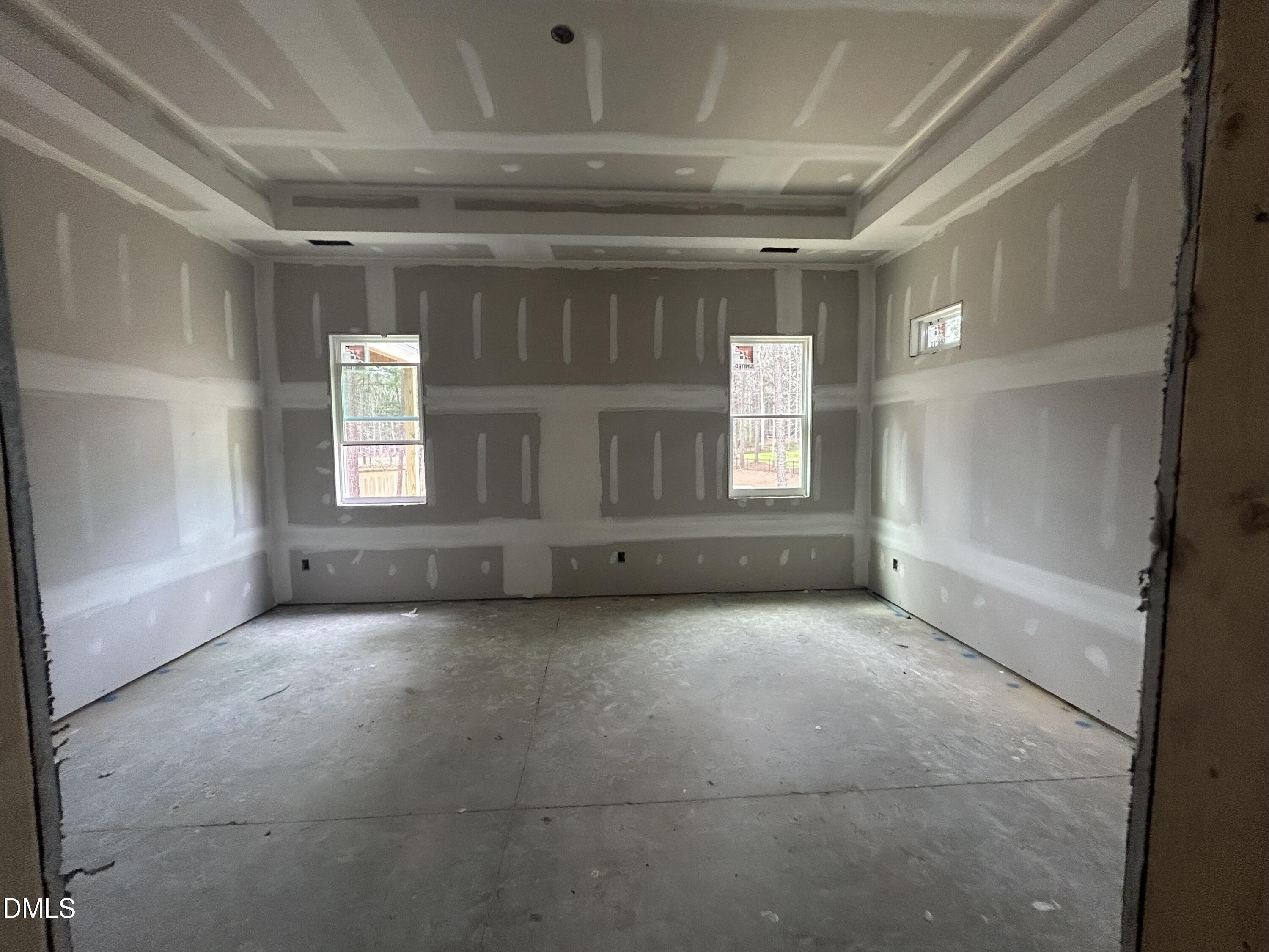 175 Landon Ridge Sanford, NC 27330 - Photo 4 of 20 a view of an empty room with a window