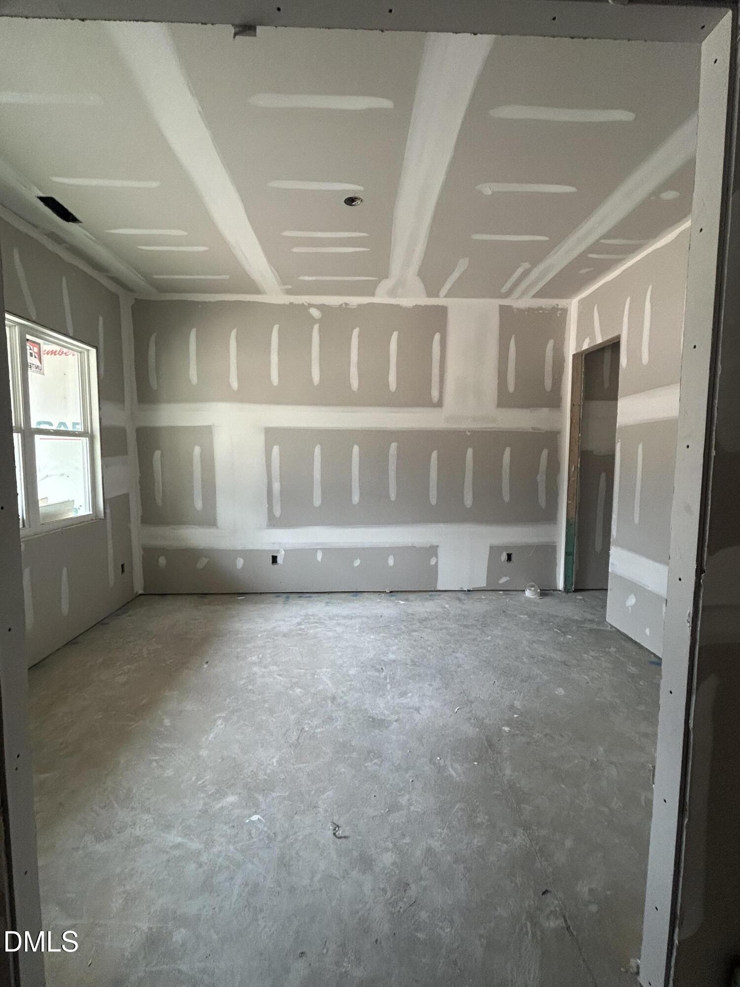 175 Landon Ridge Sanford, NC 27330 - Photo 6 of 20 a view of an empty room with a window