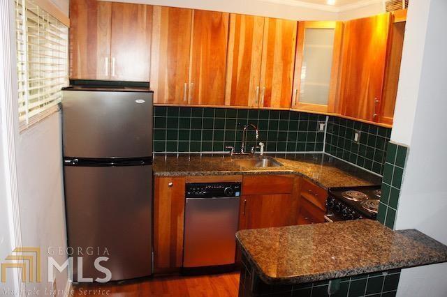 699 Argonne Avenue Northeast, Unit 4 Atlanta, GA 30308 - Photo 2 of 6 a room with storage and utility