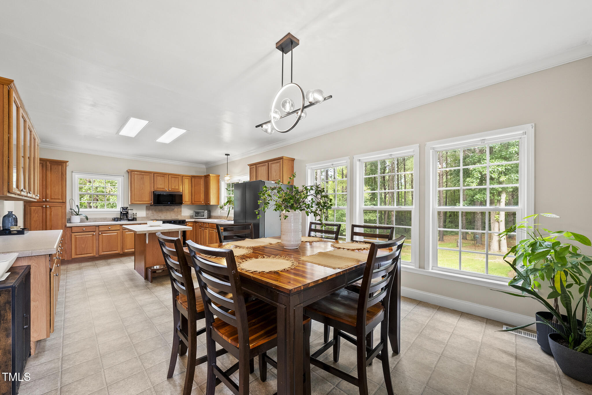 204 W Road Angier, NC 27501 - Photo 1 of 45 a view of a dining room with furniture window and outside view