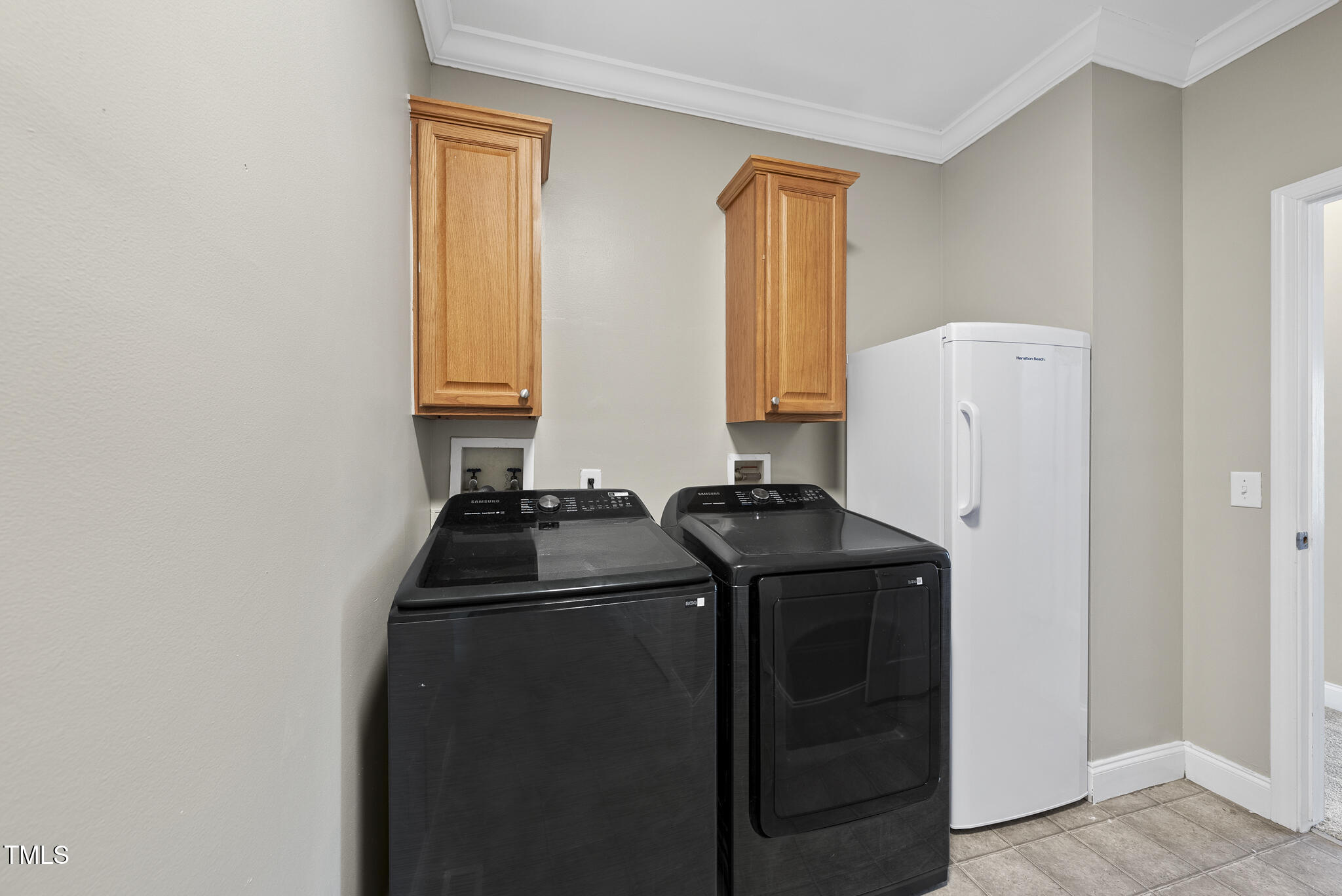 204 W Road Angier, NC 27501 - Photo 16 of 45 a kitchen with a refrigerator and window