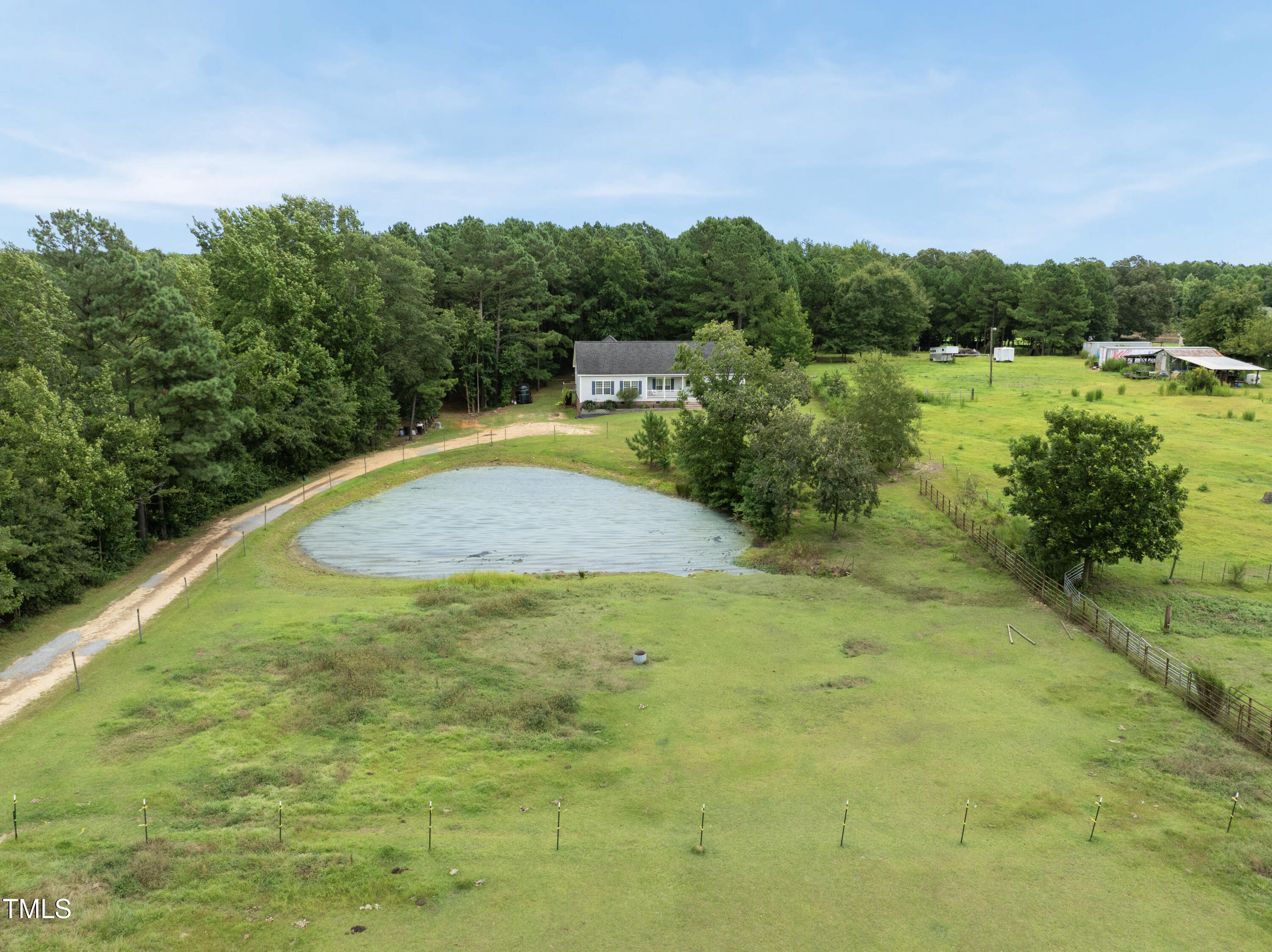 204 W Road Angier, NC 27501 - Photo 39 of 45 a view of a lake with a yard