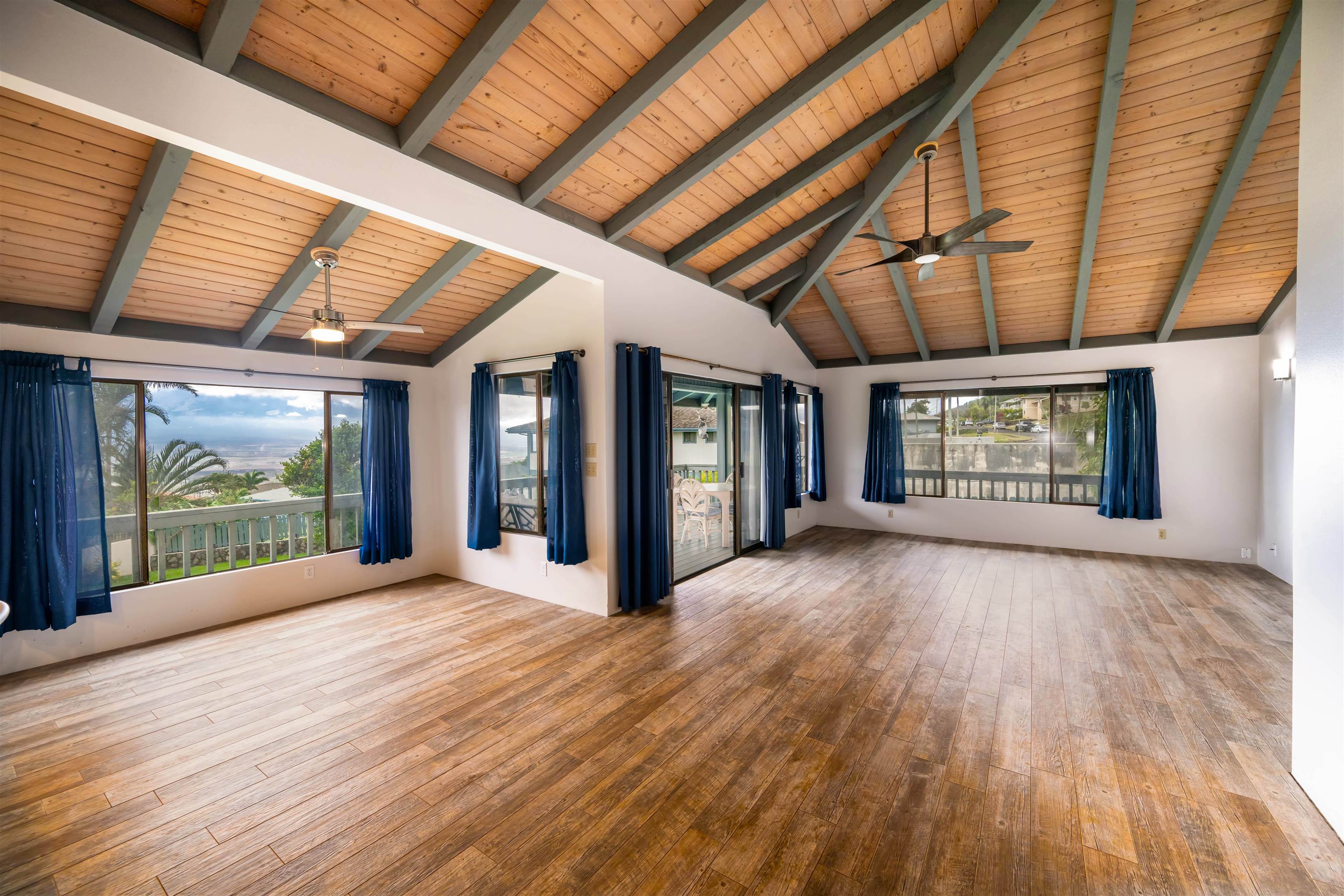 657 Mapuana Place Wailuku, HI 96793 - Photo 20 of 30 a view of an empty room with wooden floor and a window