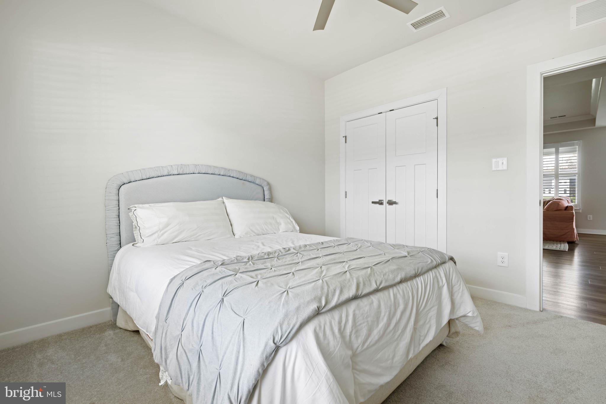 37689 Wildwood Lane Dagsboro, DE 19939 - Photo 24 of 43 a bedroom with a bed and a table