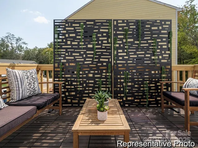a view of a balcony with wooden floor