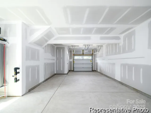 a view of an empty room with a fireplace