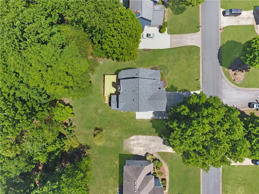 6259 Spring Lake Drive Flowery Branch, GA 30542 - Photo 27 of 35 an aerial view of a house with a yard and garden
