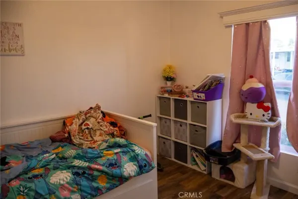 a room with furniture and a window