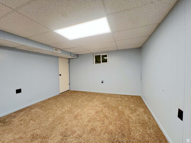 3138 Jean Street Magna, UT 84044 - Photo 22 of 26 Carpeted room with a drop ceiling, rectangular overhead light fixture, and light blue walls