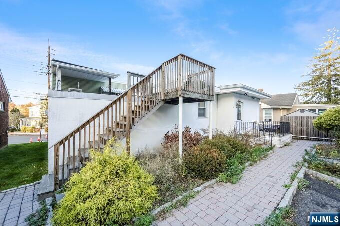 715 Main Street Caldwell, NJ 07006 - Photo 20 of 24 a front view of a house with garden