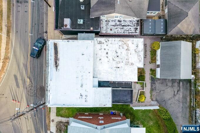 715 Main Street Caldwell, NJ 07006 - Photo 7 of 24 an aerial view of multiple house with a yard