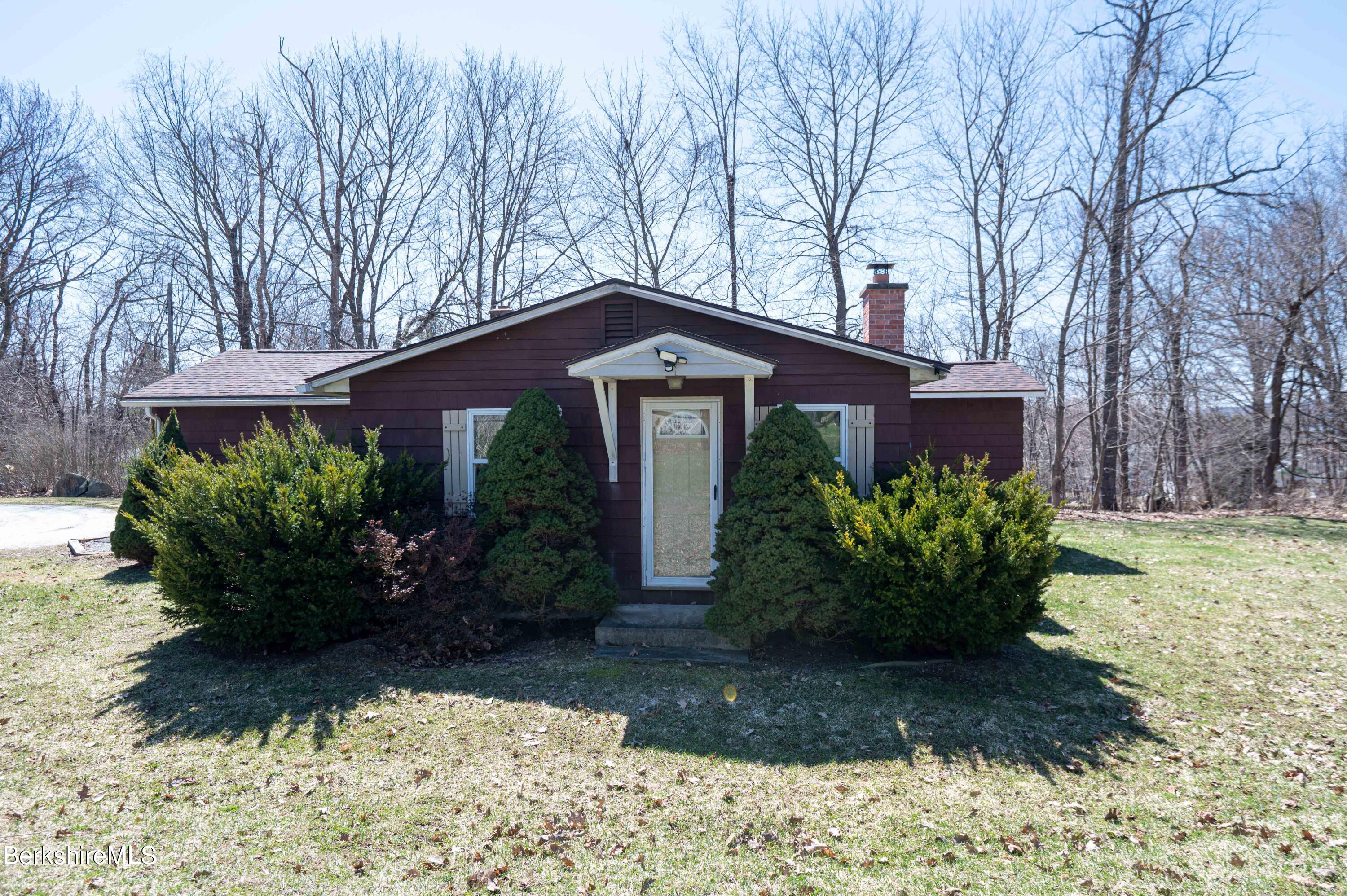 28 Adell Street Pittsfield, MA 01201 - Photo 3 of 26 a front view of a house with garden