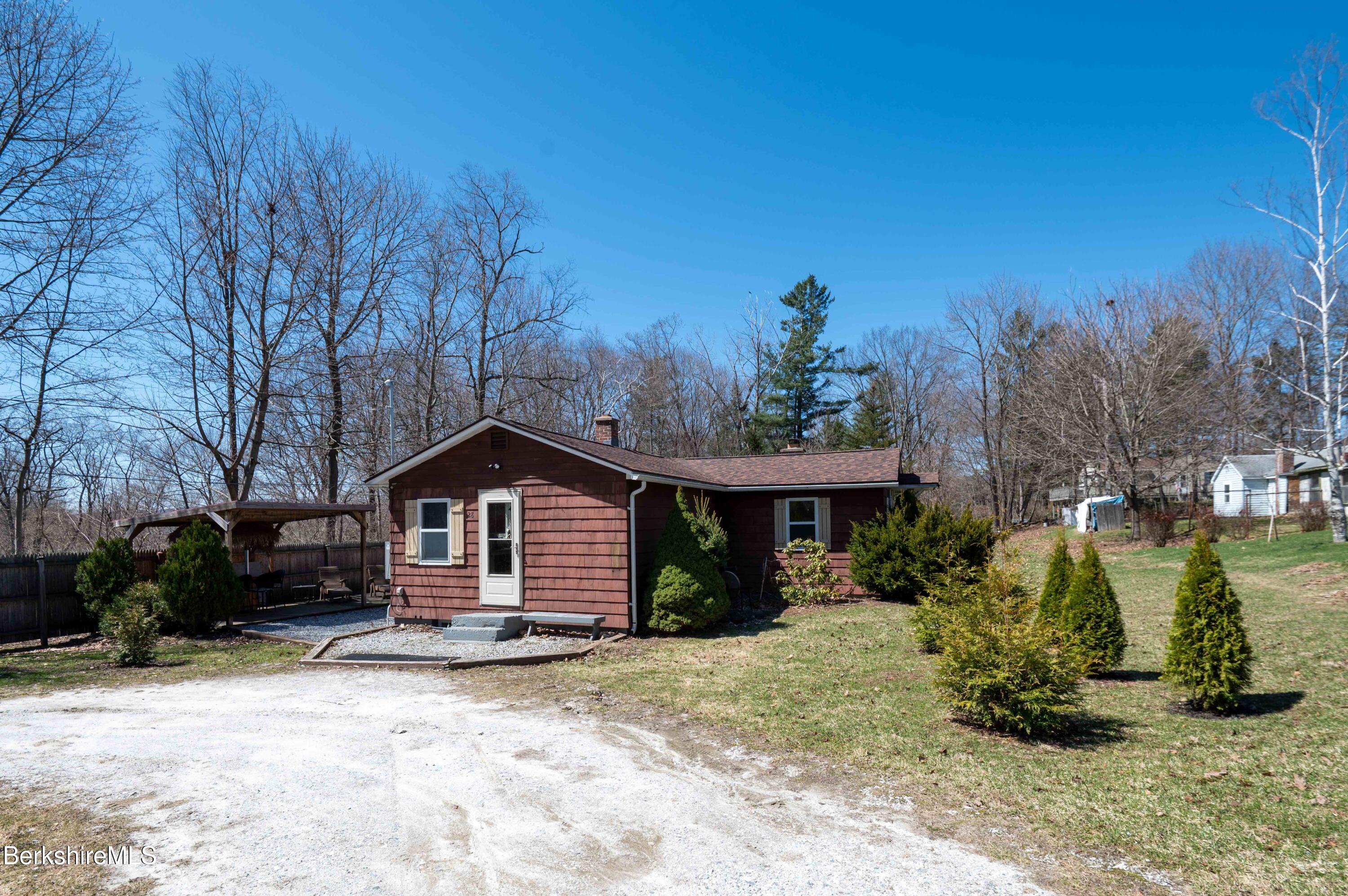 28 Adell Street Pittsfield, MA 01201 - Photo 5 of 26 a front view of a house with a yard