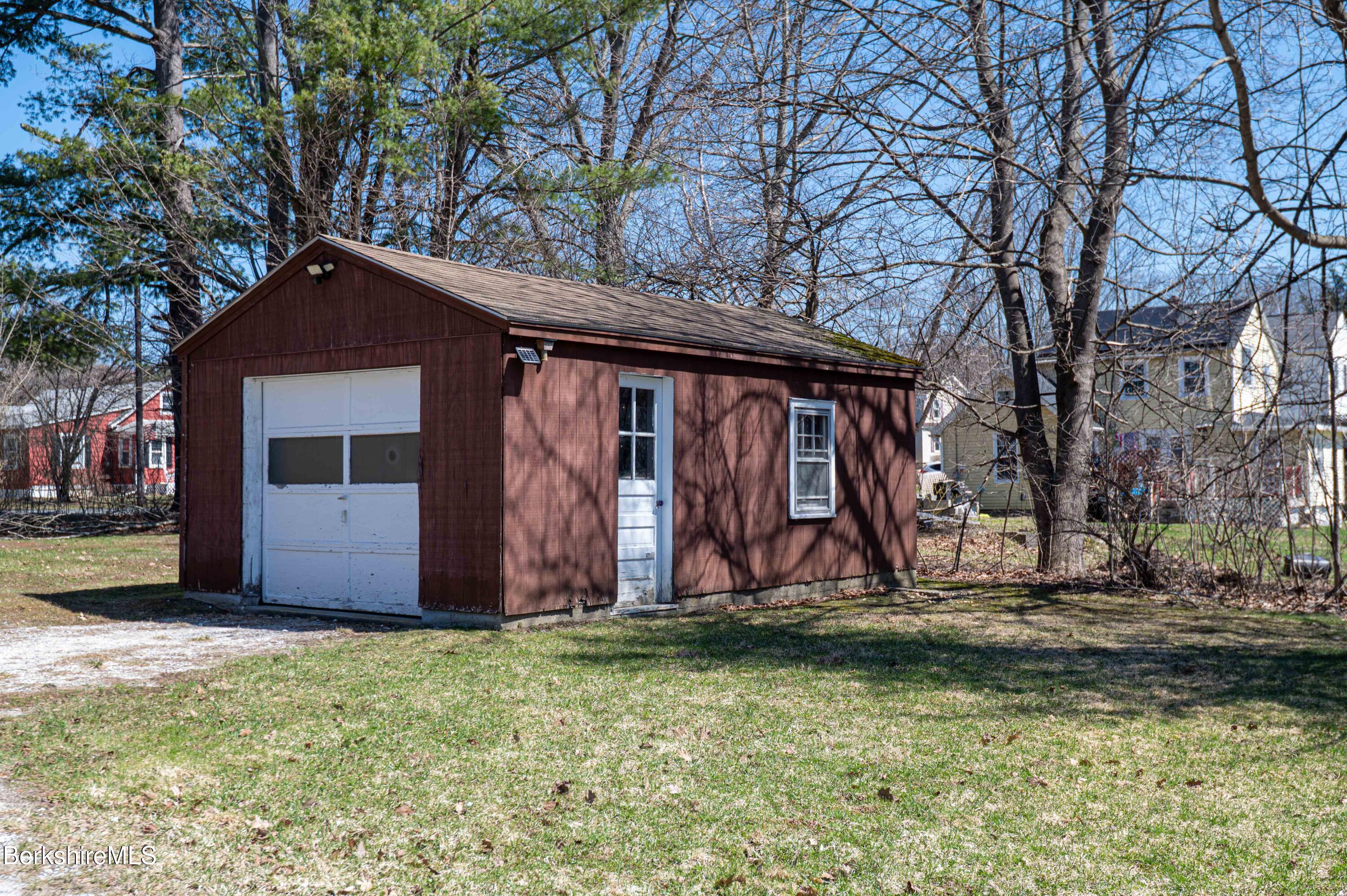 28 Adell Street Pittsfield, MA 01201 - Photo 6 of 26 a front view of house with yard