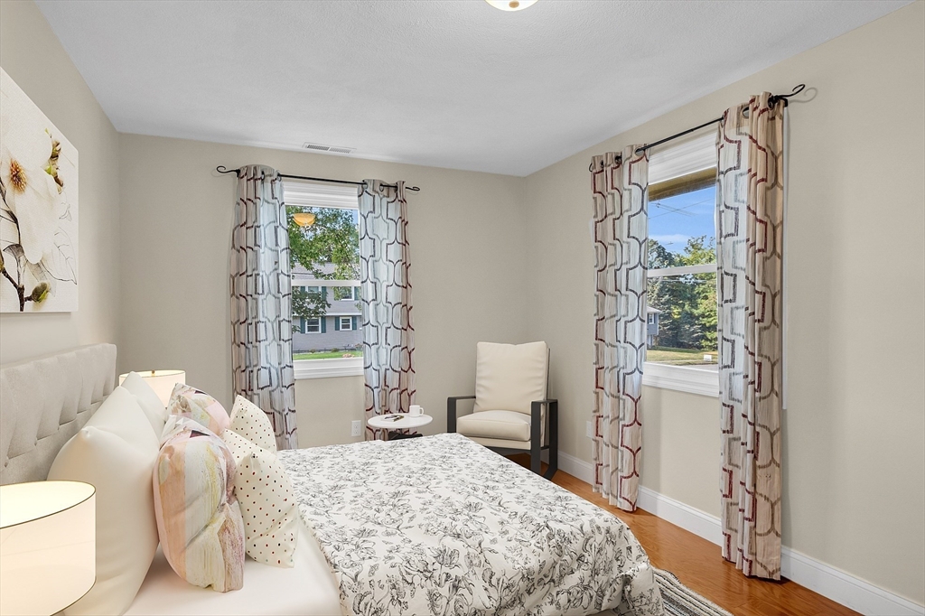 1 Alan Road Hudson, MA 01749 - Photo 17 of 38 a bedroom with a bed and a window