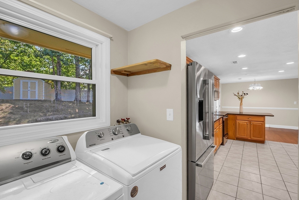 1 Alan Road Hudson, MA 01749 - Photo 31 of 38 a view of washer and dryer with bathroom