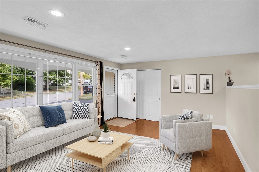 1 Alan Road Hudson, MA 01749 - Photo 4 of 38 a living room with furniture and a large window