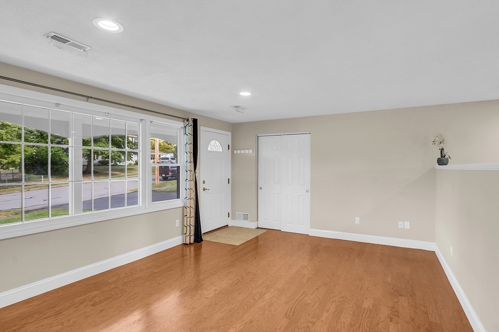 1 Alan Road Hudson, MA 01749 - Photo 6 of 38 a view of an empty room with a window