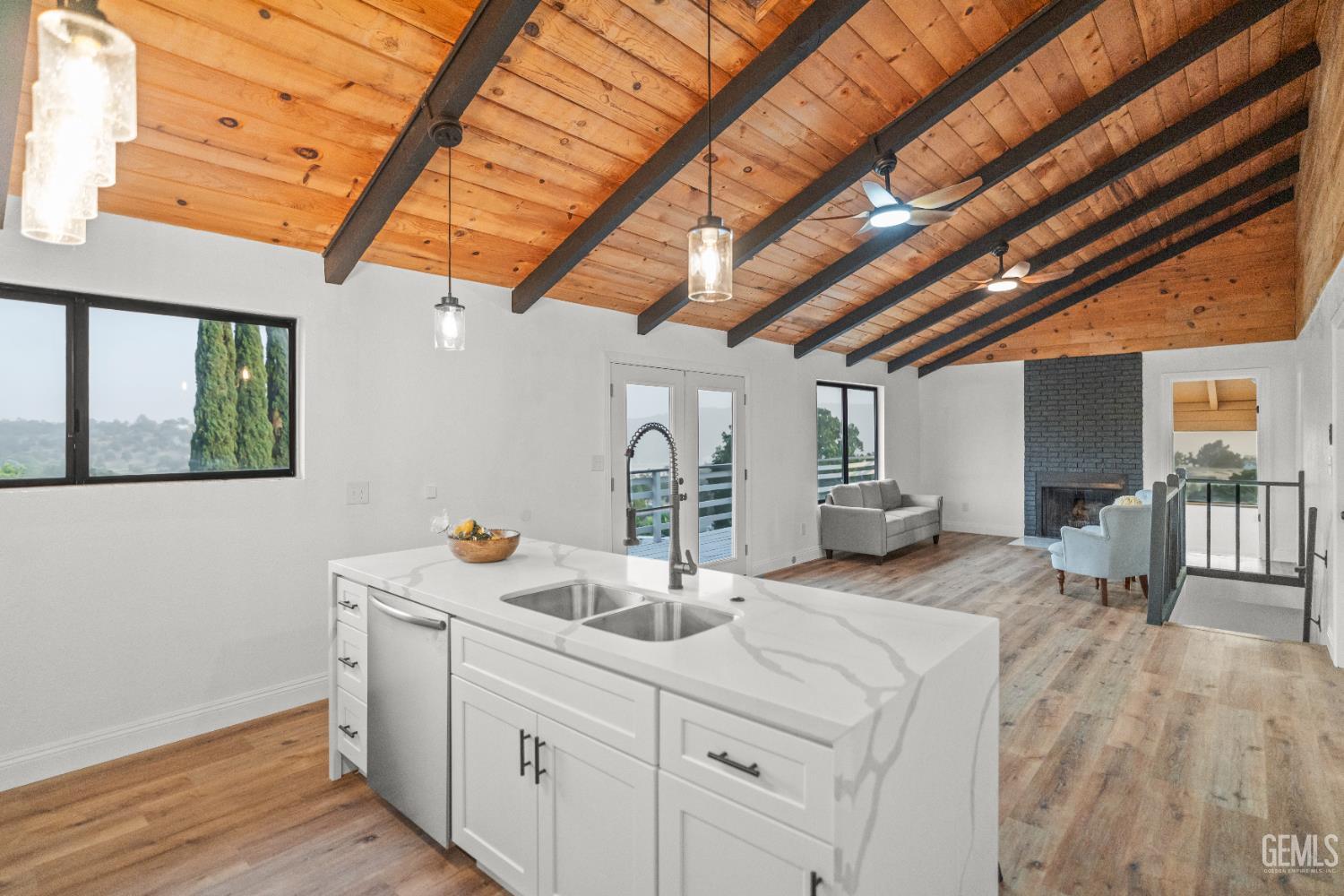 Undisclosed Address Tehachapi, CA 93561 - Photo 14 of 60 a view of a kitchen with sink and wooden floor